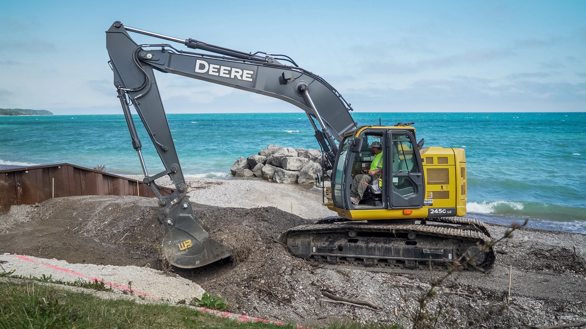 Excavator on beach